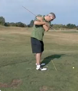 Torso moving down and forward in golf swing