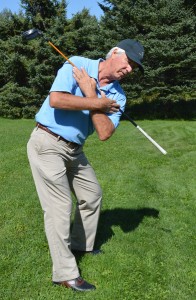 With the spine angle set at address rotate the shoulders at a 90 degree angle to the spine.