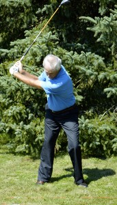 The forward swing starts from the bottoms up, a lateral motion of your knees and hips, followed by the rotation of the hips and shoulders in unison.